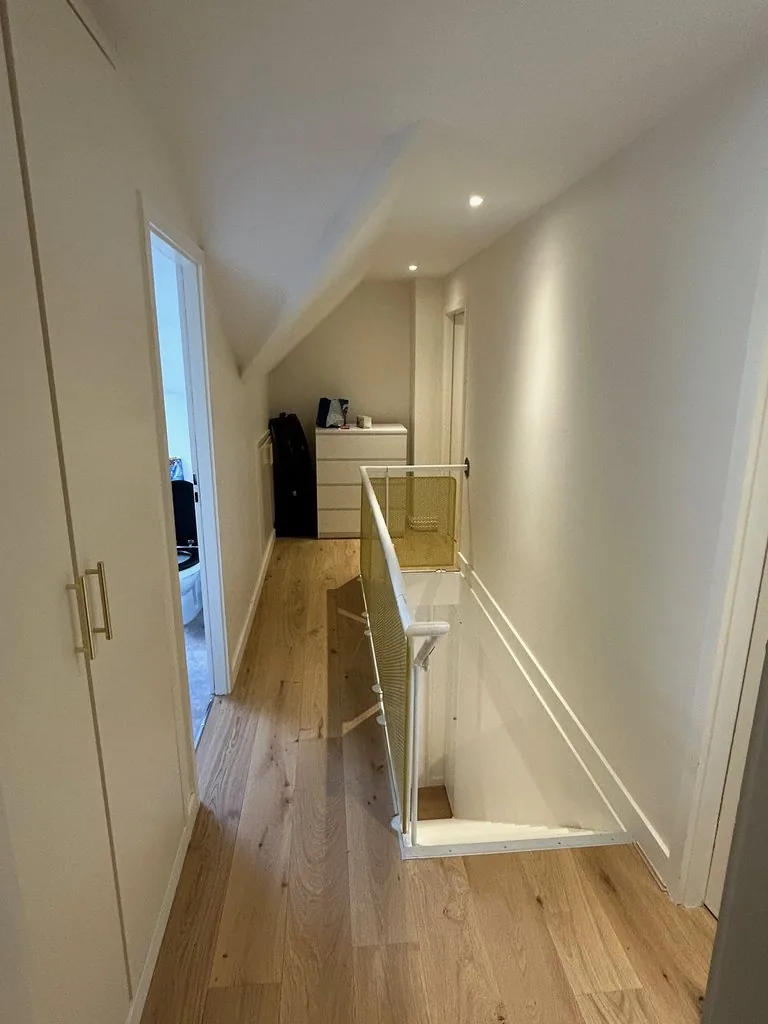 Rénovation complète d'un appartement à Lille - après, le palier de l'étage